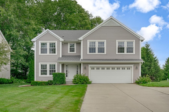 1860 Partridge Ln, Kalamazoo, MI 49009 - traditional home with driveway, a front lawn, a garage, and roof with shingles