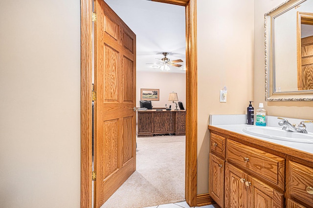 11683 Fair Lk, Delton, MI 49046 - bathroom with vanity, ceiling fan, and tile patterned floors