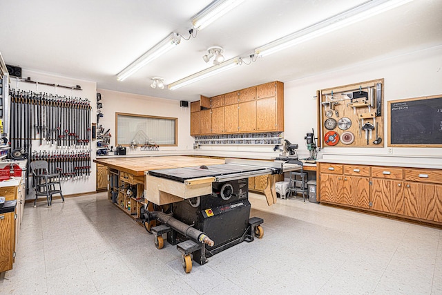 11683 Fair Lk, Delton, MI 49046 - kitchen with light flooring, light countertops, and brown cabinets