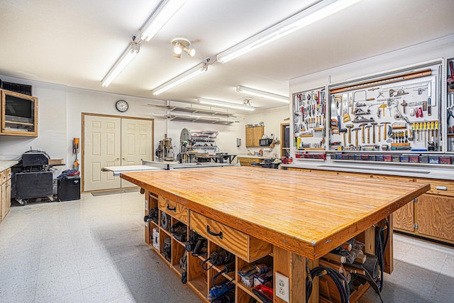 11683 Fair Lk, Delton, MI 49046 - dining space with a workshop area and light flooring