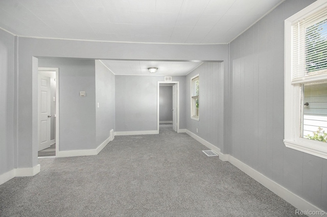 38 E Ypsilanti Ave, Southfield, MI 48340 - unfurnished room featuring carpet floors and plenty of natural light