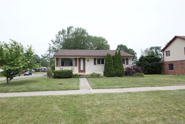 29716 Joy Rd, Livonia, MI 48150 - view of front facade with a front yard and brick siding