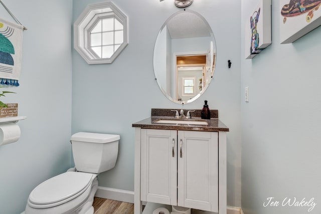278 Caravan Rd, Norton Shores, MI 49441 - bathroom featuring vanity and wood finished floors