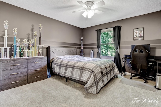 278 Caravan Rd, Norton Shores, MI 49441 - bedroom with carpet, an office area, ceiling fan, and a textured ceiling