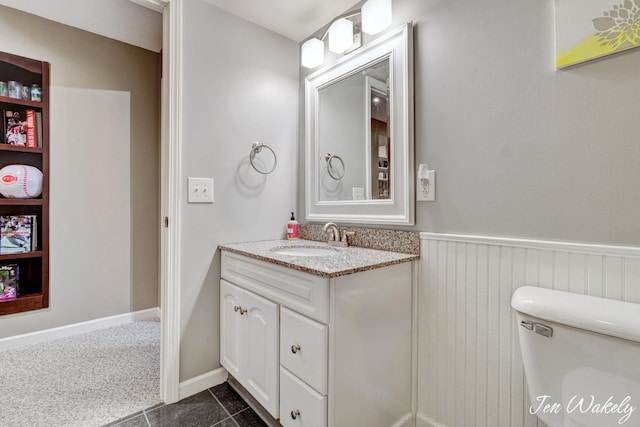 278 Caravan Rd, Norton Shores, MI 49441 - bathroom featuring vanity and tile patterned floors