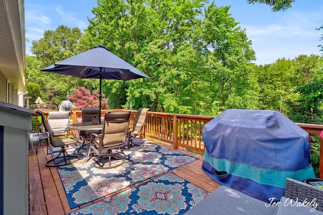 278 Caravan Rd, Norton Shores, MI 49441 - deck with outdoor dining space and area for grilling