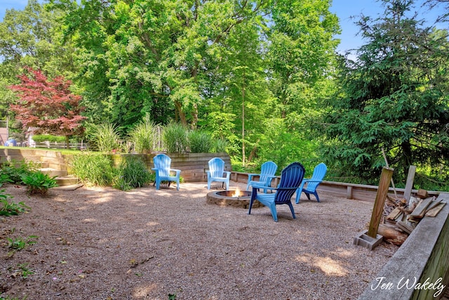 278 Caravan Rd, Norton Shores, MI 49441 - view of yard featuring a fire pit
