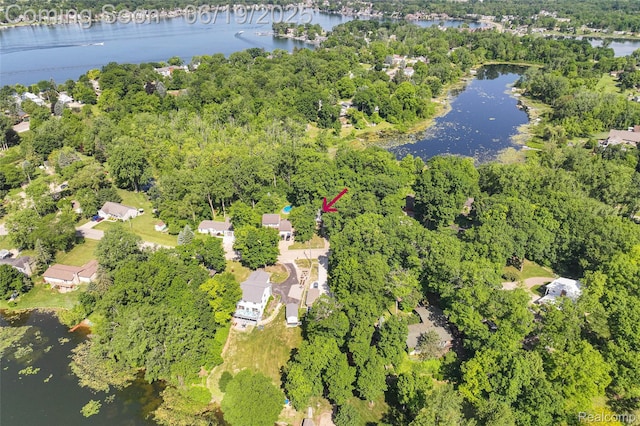 12260 Dollar Lake Dr, Fenton, MI 48430 - aerial overview of property's location featuring a nearby body of water