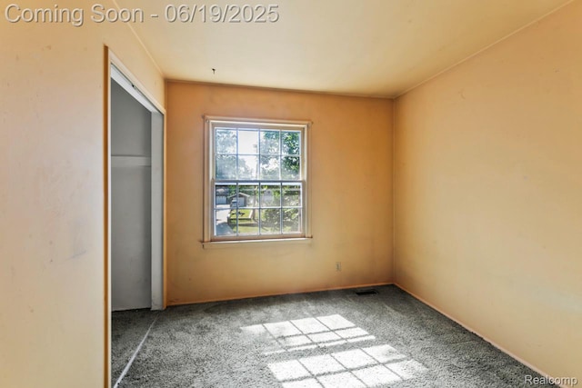 12260 Dollar Lake Dr, Fenton, MI 48430 - unfurnished bedroom with carpet floors and a closet