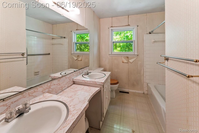 12260 Dollar Lake Dr, Fenton, MI 48430 - full bath featuring vanity and washtub / shower combination