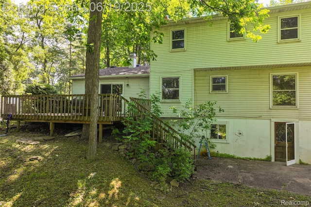 12260 Dollar Lake Dr, Fenton, MI 48430 - back of property featuring a deck and stairway