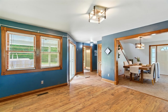 8368 N 46th St, Augusta, MI 49012 - dining space featuring wood finished floors and lofted ceiling