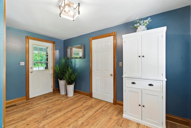8368 N 46th St, Augusta, MI 49012 - foyer featuring baseboards and light wood-type flooring