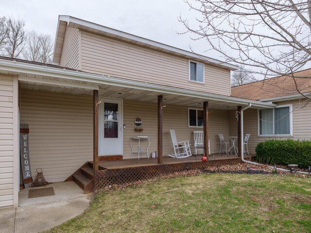 8368 N 46th St, Augusta, MI 49012 - view of front of house with covered porch and a front yard