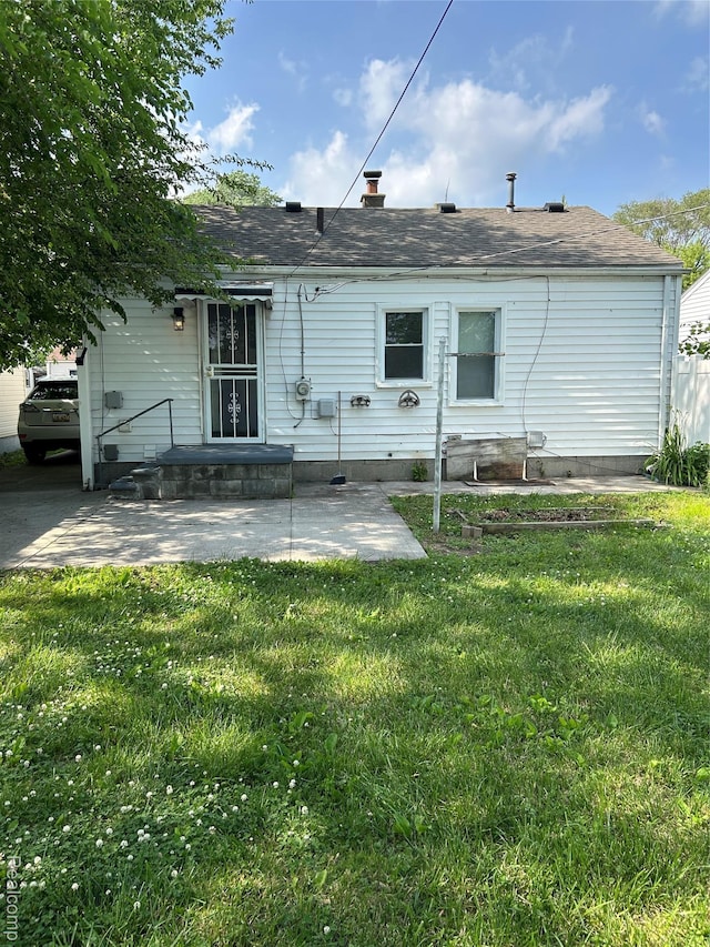 11236 Studebaker Ave, Warren, MI 48089 - back of property with a lawn, a patio, and a chimney