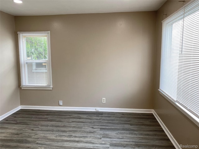 11236 Studebaker Ave, Warren, MI 48089 - empty room with dark wood-style flooring and recessed lighting