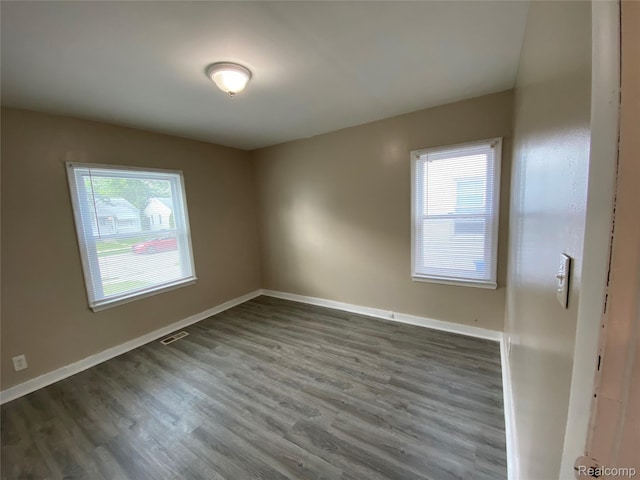 11236 Studebaker Ave, Warren, MI 48089 - spare room with dark wood-type flooring and baseboards