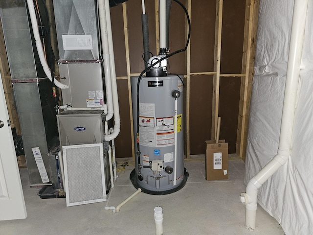 8781 Prairie Stone Dr SW, Byron Center, MI 49315 - utility room with water heater