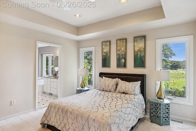 5520 Huron Hills Dr, Commerce Twp, MI 48382 - bedroom featuring recessed lighting, a tray ceiling, and ensuite bathroom