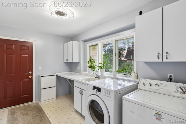 5520 Huron Hills Dr, Commerce Twp, MI 48382 - laundry area featuring cabinet space, washer and clothes dryer, and light flooring