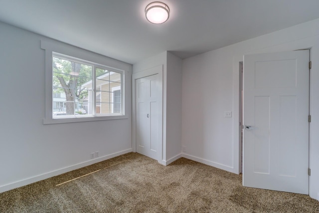 28 E Southern Ave, Muskegon, MI 49442 - unfurnished bedroom with carpet and a closet