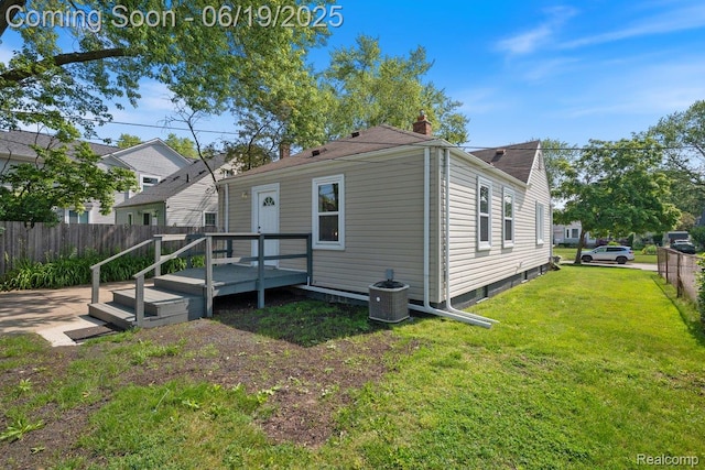 2755 Royal Ave, Berkley, MI 48072 - rear view of property with a wooden deck and a chimney