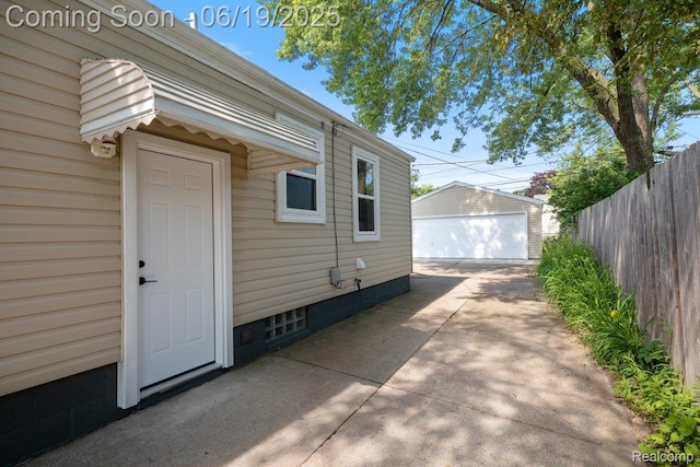 2755 Royal Ave, Berkley, MI 48072 - view of patio featuring an outdoor structure and a garage