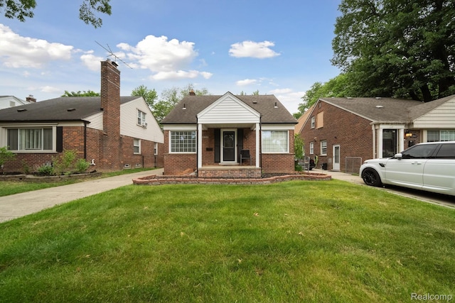 1333 N Franklin St, Dearborn, MI 48128 - bungalow-style house with brick siding and a front lawn