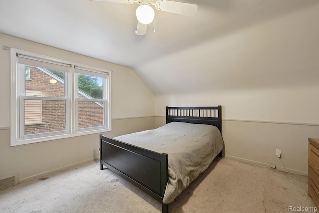 1333 N Franklin St, Dearborn, MI 48128 - bedroom featuring light carpet, lofted ceiling, and a ceiling fan