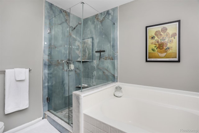 28185 Carlton Way Dr, Novi, MI 48377 - bathroom with a garden tub and a stall shower
