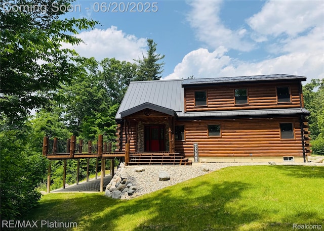 3199 N Loop Ct, Middleville, MI 49333 - back of property featuring a lawn, a standing seam roof, log exterior, a metal roof, and a wooden deck