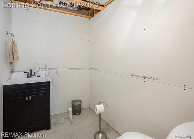 3199 N Loop Ct, Middleville, MI 49333 - half bath featuring vanity and unfinished concrete floors