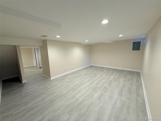 6352 Laurentian Ct, Flint, MI 48532 - finished basement with recessed lighting and wood finished floors
