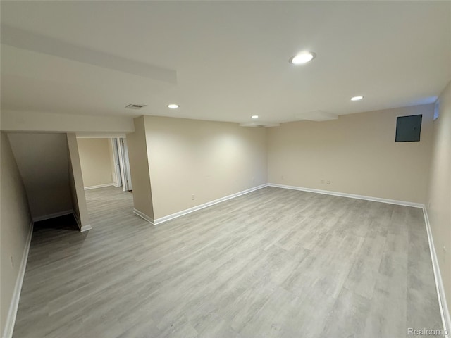 6352 Laurentian Ct, Flint, MI 48532 - finished below grade area with recessed lighting and light wood-style floors