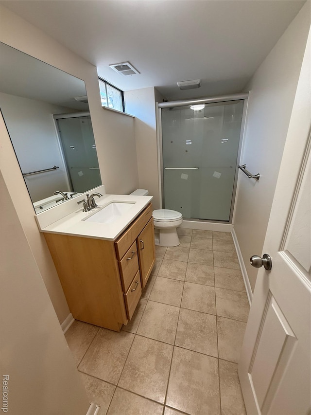 6352 Laurentian Ct, Flint, MI 48532 - bathroom featuring vanity, a stall shower, and tile patterned flooring