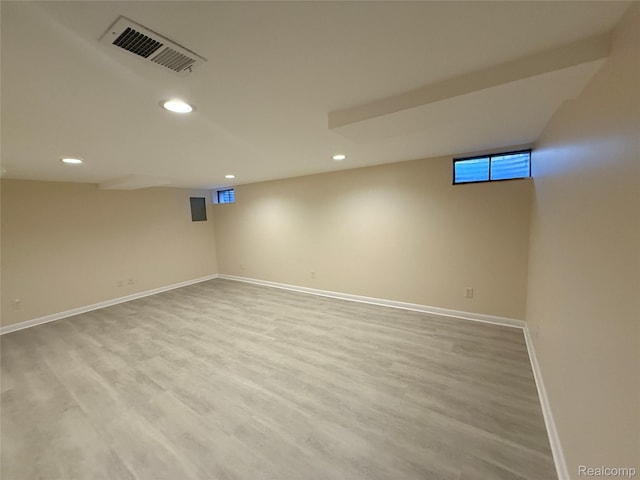 6352 Laurentian Ct, Flint, MI 48532 - below grade area featuring recessed lighting and wood finished floors