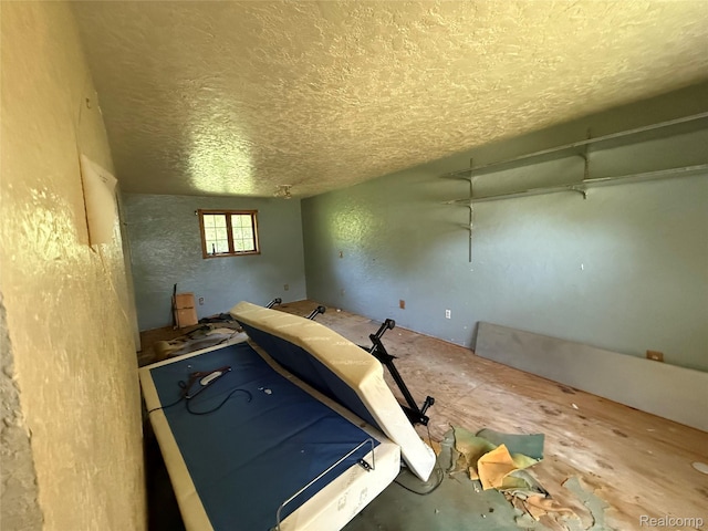 6456 W Court St, Flint, MI 48532 - misc room with a textured ceiling