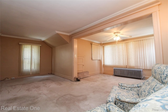 118 Massachusetts St, Highland Park, MI 48203 - unfurnished living room with radiator heating unit, ornamental molding, carpet flooring, and a ceiling fan