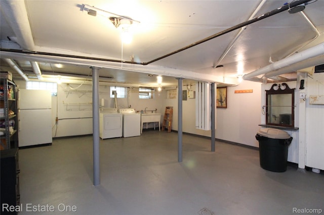 118 Massachusetts St, Highland Park, MI 48203 - basement featuring freestanding refrigerator and washer and dryer