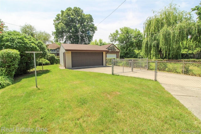 118 Massachusetts St, Highland Park, MI 48203 - view of yard with a detached garage and an outbuilding