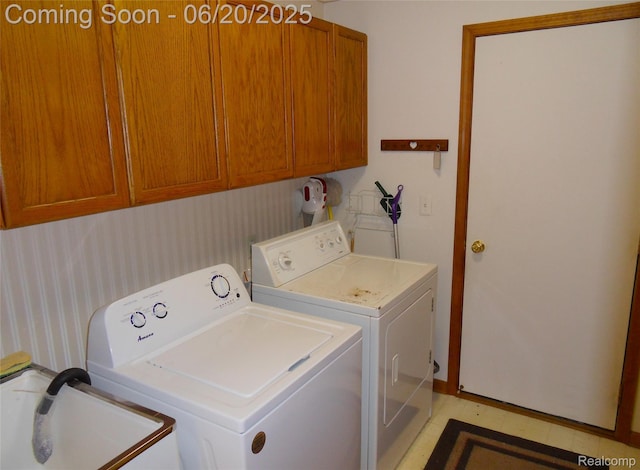 2791 Lochmoor Blvd Unit 21, Lake Orion, MI 48360 - laundry room featuring cabinet space, washing machine and clothes dryer, wallpapered walls, and light flooring