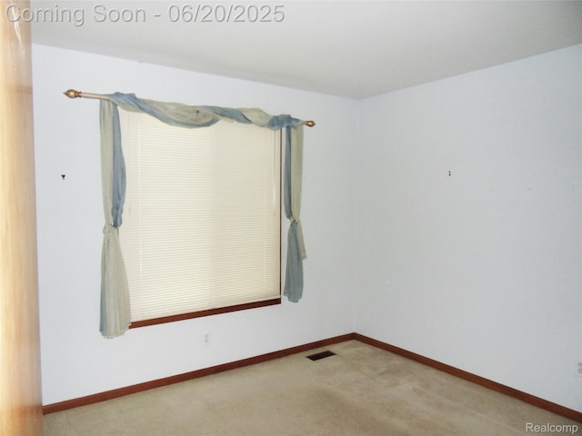 2791 Lochmoor Blvd Unit 21, Lake Orion, MI 48360 - carpeted empty room with baseboards