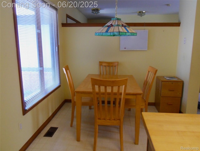 2791 Lochmoor Blvd Unit 21, Lake Orion, MI 48360 - dining space with light flooring and baseboards