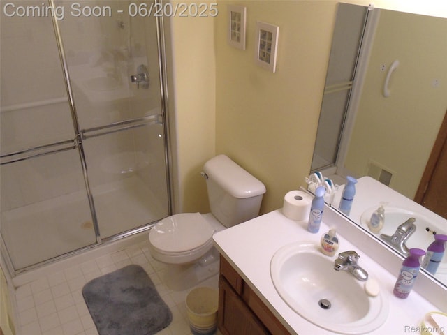 2791 Lochmoor Blvd Unit 21, Lake Orion, MI 48360 - bathroom with an enclosed shower, vanity, and tile patterned flooring