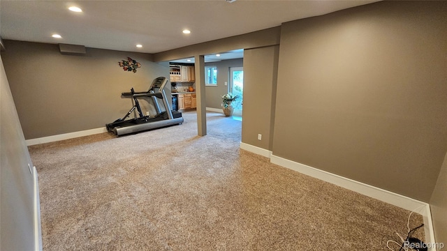 3900 Hillcrest, Highland, MI 48356 - exercise room with recessed lighting and light colored carpet