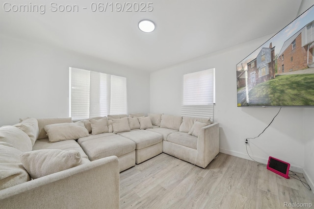15477 Lauder St, Detroit, MI 48227 - living room with light wood-style flooring and baseboards