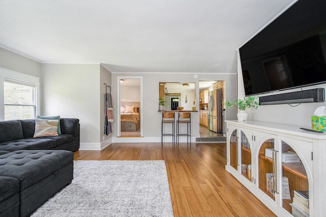 8041 Donovan Rd, Dexter, MI 48130 - living room with wood finished floors and baseboards