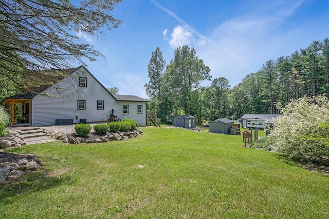 8041 Donovan Rd, Dexter, MI 48130 - view of grassy yard with a shed
