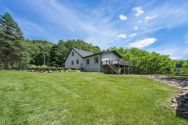 8041 Donovan Rd, Dexter, MI 48130 - view of grassy yard featuring stairs and a deck