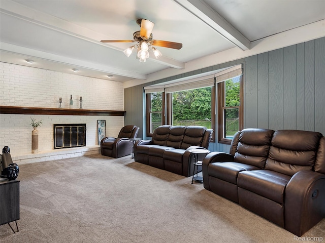 1890 Ludgate Ln, Rochester Hills, MI 48309 - living area featuring beamed ceiling, carpet floors, a ceiling fan, brick wall, and a brick fireplace
